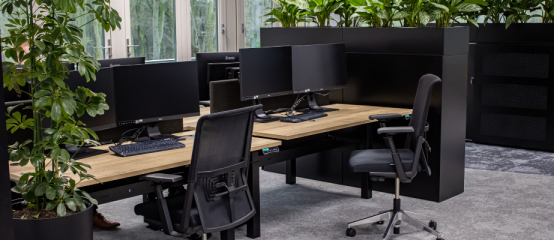 Hoe richt je een ergonomische werkplek in met een bureau?
